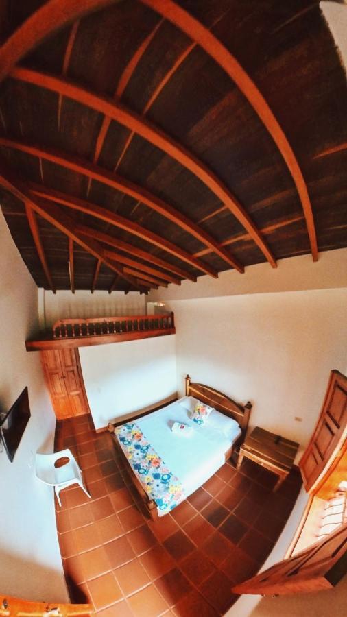 La Casa De Las Flores Hostal Jardín Esterno foto