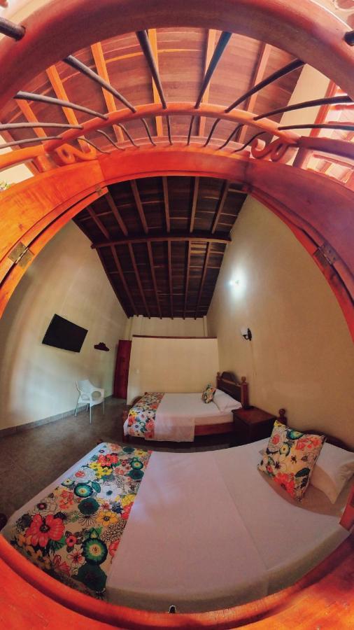 La Casa De Las Flores Hostal Jardín Esterno foto