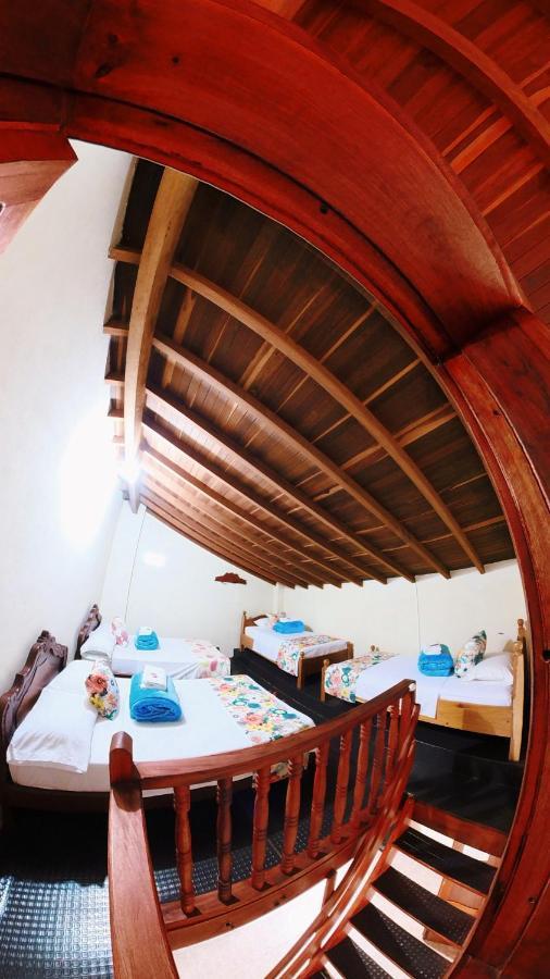 La Casa De Las Flores Hostal Jardín Esterno foto