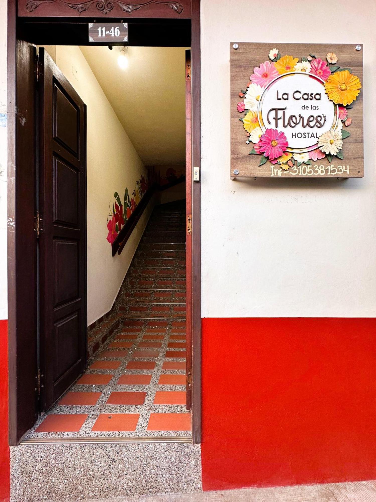 La Casa De Las Flores Hostal Jardín Esterno foto